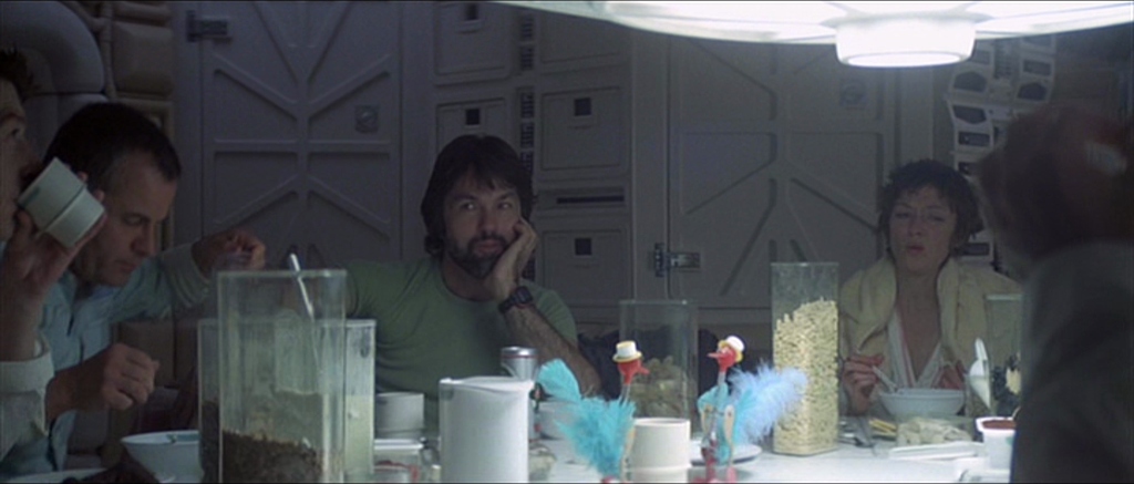 Crewmembers eating breakfast in Ridley Scott's Alien